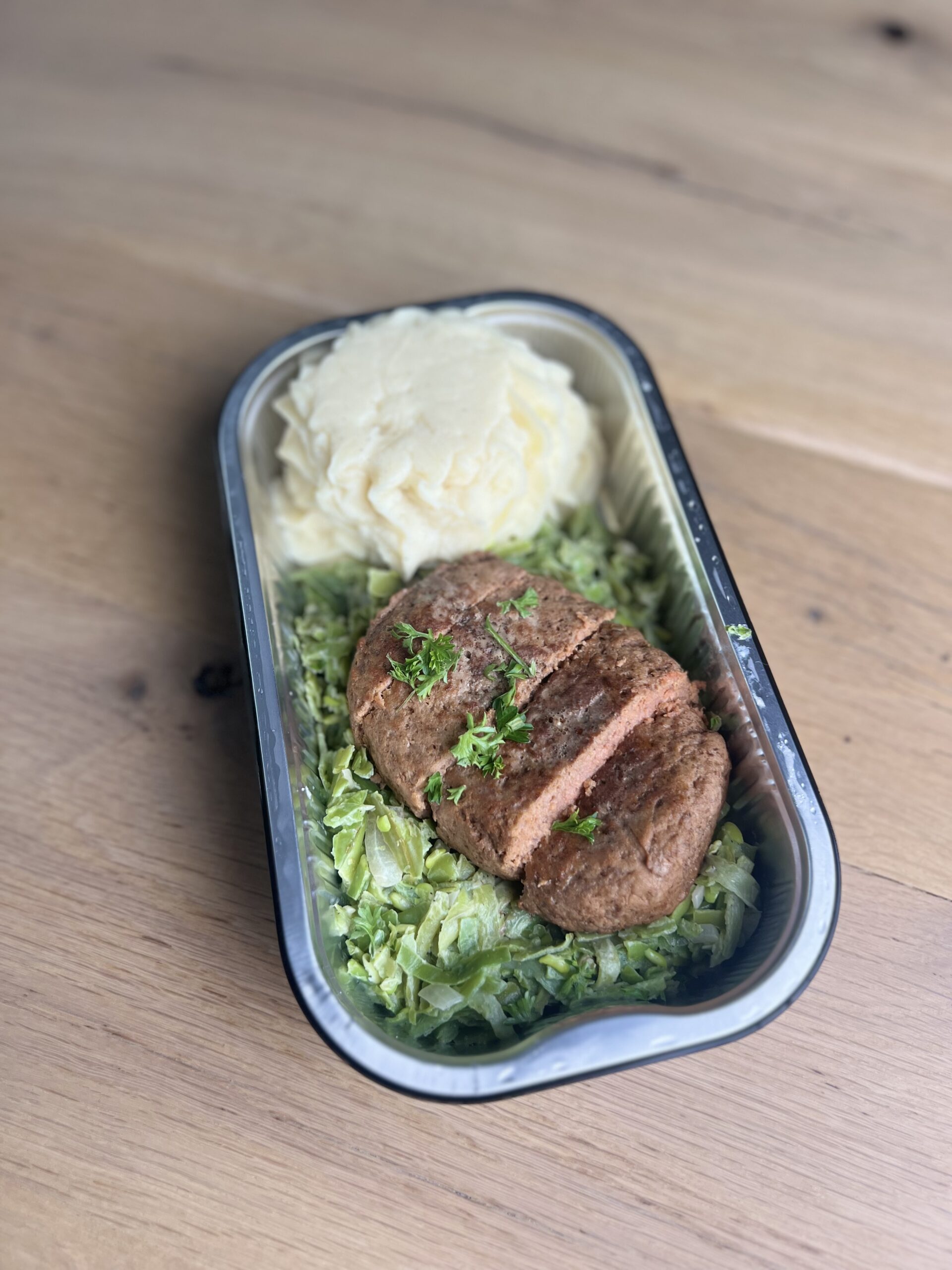 Schnitzel met bladspinazie-mozzarella en puree